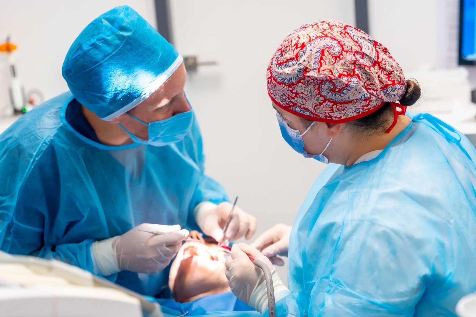 Oral Surgeon During Tooth Extraction Procedure